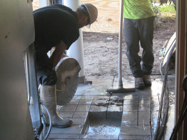 Cutting into existing Slab for new footings.