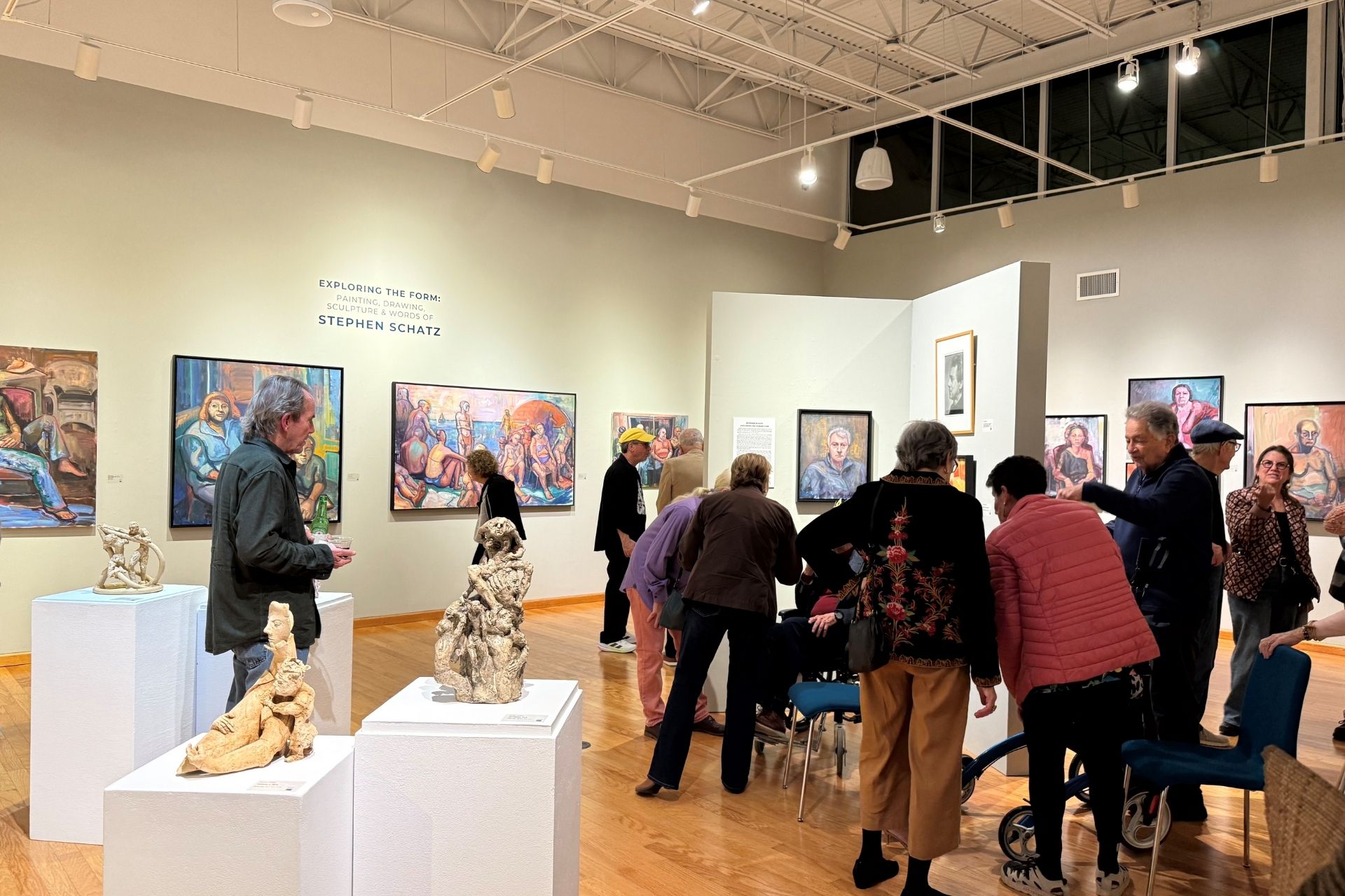 Get Involved | people at art exhibit